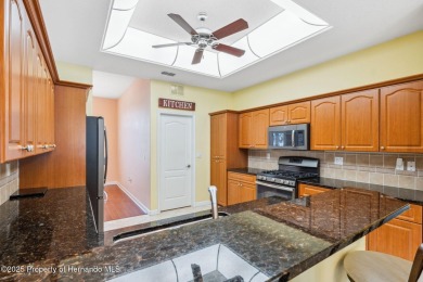 Tucked within the gated golfing community of Hernando Oaks, this on Hernando Oaks Golf and Country Club in Florida - for sale on GolfHomes.com, golf home, golf lot