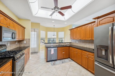 Tucked within the gated golfing community of Hernando Oaks, this on Hernando Oaks Golf and Country Club in Florida - for sale on GolfHomes.com, golf home, golf lot