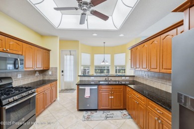 Tucked within the gated golfing community of Hernando Oaks, this on Hernando Oaks Golf and Country Club in Florida - for sale on GolfHomes.com, golf home, golf lot