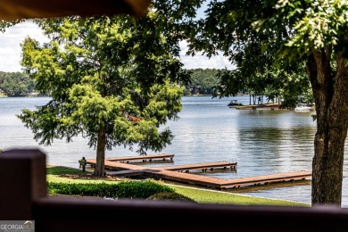 This unique and inviting retreat provides the perfect experience on The Golf Club at Cuscowilla in Georgia - for sale on GolfHomes.com, golf home, golf lot