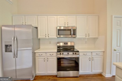 Almost 3000 heated square feet and backs up to the Golf Course on Summergrove Golf Club in Georgia - for sale on GolfHomes.com, golf home, golf lot