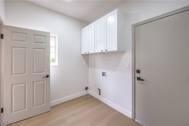 Located in the sought-after 55+ Sun City Summerlin community on Eagle Crest Golf Club in Nevada - for sale on GolfHomes.com, golf home, golf lot