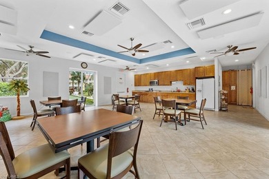 Grab a drink of your choice, head to the lanai and watch the on Royal Wood Golf and Country Club in Florida - for sale on GolfHomes.com, golf home, golf lot
