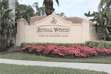 Grab a drink of your choice, head to the lanai and watch the on Royal Wood Golf and Country Club in Florida - for sale on GolfHomes.com, golf home, golf lot