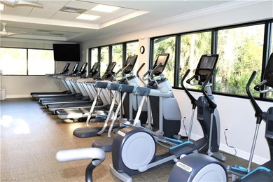 Grab a drink of your choice, head to the lanai and watch the on Royal Wood Golf and Country Club in Florida - for sale on GolfHomes.com, golf home, golf lot