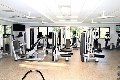 Grab a drink of your choice, head to the lanai and watch the on Royal Wood Golf and Country Club in Florida - for sale on GolfHomes.com, golf home, golf lot