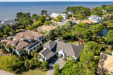 Nestled within the gated Burnt Pine community, this exquisite on Sandestin Golf and Beach Resort - Raven in Florida - for sale on GolfHomes.com, golf home, golf lot