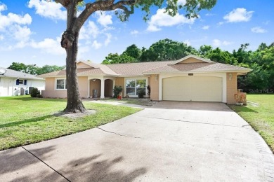 Welcome to this spacious 3-bedroom, 3-bath home on a large on Beacon Woods Golf Club in Florida - for sale on GolfHomes.com, golf home, golf lot