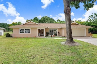 Welcome to this spacious 3-bedroom, 3-bath home on a large on Beacon Woods Golf Club in Florida - for sale on GolfHomes.com, golf home, golf lot
