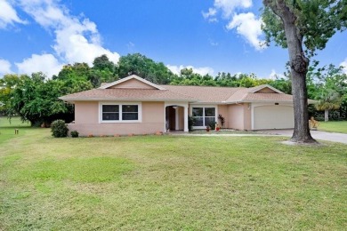 Welcome to this spacious 3-bedroom, 3-bath home on a large on Beacon Woods Golf Club in Florida - for sale on GolfHomes.com, golf home, golf lot