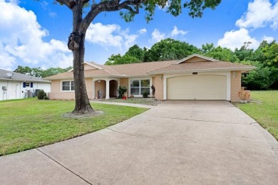 Welcome to this spacious 3-bedroom, 3-bath home on a large on Beacon Woods Golf Club in Florida - for sale on GolfHomes.com, golf home, golf lot