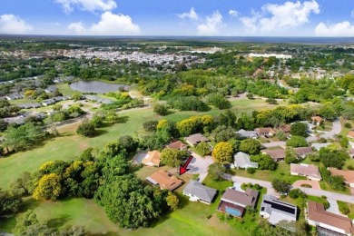 Welcome to this spacious 3-bedroom, 3-bath home on a large on Beacon Woods Golf Club in Florida - for sale on GolfHomes.com, golf home, golf lot