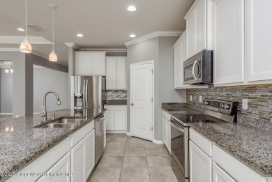 Welcome to this beautifully maintained 4-bedroom, 3.5-bathroom on Silverthorn Country Club in Florida - for sale on GolfHomes.com, golf home, golf lot