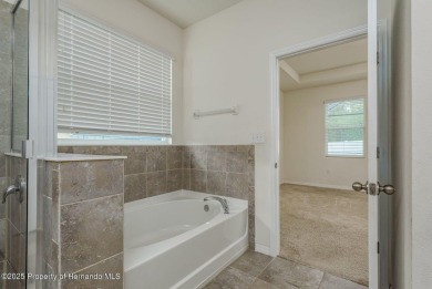 Welcome to this beautifully maintained 4-bedroom, 3.5-bathroom on Silverthorn Country Club in Florida - for sale on GolfHomes.com, golf home, golf lot