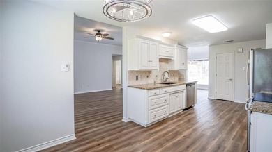 Corner lot in Pecan Plantation! This 2-bedroom, 2-bath home sits on Pecan Plantation Country Club in Texas - for sale on GolfHomes.com, golf home, golf lot