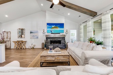 Welcome to 8861 Nottoway Drive in Calabash-a beautiful custom on Brunswick Plantation and Golf Resorts in North Carolina - for sale on GolfHomes.com, golf home, golf lot