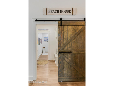 Welcome to 8861 Nottoway Drive in Calabash--a beautiful custom on Brunswick Plantation and Golf Resorts in North Carolina - for sale on GolfHomes.com, golf home, golf lot