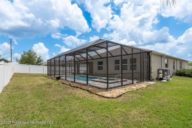 Welcome to this beautifully maintained 4-bedroom, 3.5-bathroom on Silverthorn Country Club in Florida - for sale on GolfHomes.com, golf home, golf lot
