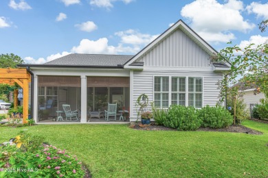 Welcome to 8861 Nottoway Drive in Calabash--a beautiful custom on Brunswick Plantation and Golf Resorts in North Carolina - for sale on GolfHomes.com, golf home, golf lot