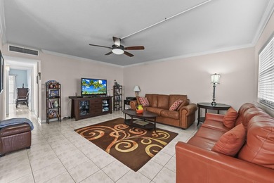 Immerse yourself in tranquil comfort at 213 Brittany E in the on Kings Point Golf -Flanders Way in Florida - for sale on GolfHomes.com, golf home, golf lot