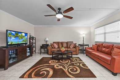 Immerse yourself in tranquil comfort at 213 Brittany E in the on Kings Point Golf -Flanders Way in Florida - for sale on GolfHomes.com, golf home, golf lot