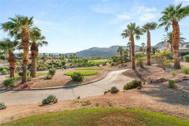 Perched on a premier lot in Red Rock Country Club, the two-story on Red Rock Country Club in Nevada - for sale on GolfHomes.com, golf home, golf lot