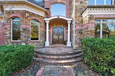 Discover unparalleled luxury and breathtaking golf course views on St. Marlo Country Club in Georgia - for sale on GolfHomes.com, golf home, golf lot