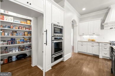 Experience resort-style living in the highly sought-after Manor on Manor Golf and Country Club in Georgia - for sale on GolfHomes.com, golf home, golf lot