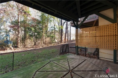 Conveniently located near schools, campus, dining, shopping, UGA on University of Georgia Golf Course in Georgia - for sale on GolfHomes.com, golf home, golf lot