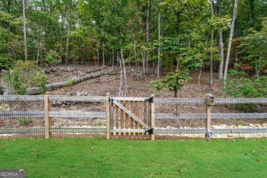 Welcome home to the amazing community of Lake Arrowhead. Nestled on The Highlands Course at Lake Arrowhead in Georgia - for sale on GolfHomes.com, golf home, golf lot