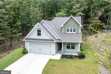 Welcome home to the amazing community of Lake Arrowhead. Nestled on The Highlands Course at Lake Arrowhead in Georgia - for sale on GolfHomes.com, golf home, golf lot