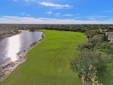 Welcome to refined living with captivating golf, lake  bridge on Parkland Golf Club in Florida - for sale on GolfHomes.com, golf home, golf lot