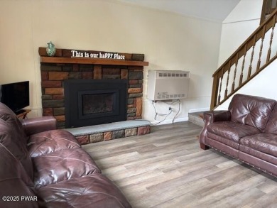 This simply sweet chalet getaway is nestled on a pretty forested on The Hideout Golf in Pennsylvania - for sale on GolfHomes.com, golf home, golf lot
