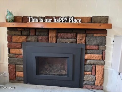 This simply sweet chalet getaway is nestled on a pretty forested on The Hideout Golf in Pennsylvania - for sale on GolfHomes.com, golf home, golf lot