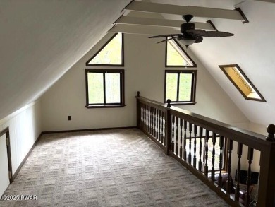 This simply sweet chalet getaway is nestled on a pretty forested on The Hideout Golf in Pennsylvania - for sale on GolfHomes.com, golf home, golf lot