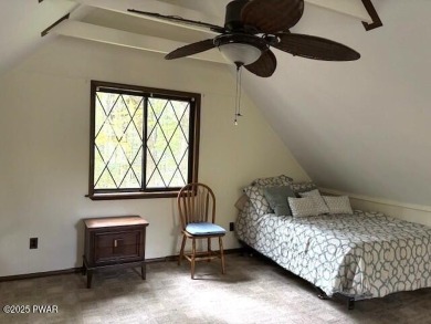 This simply sweet chalet getaway is nestled on a pretty forested on The Hideout Golf in Pennsylvania - for sale on GolfHomes.com, golf home, golf lot
