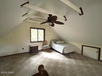 This simply sweet chalet getaway is nestled on a pretty forested on The Hideout Golf in Pennsylvania - for sale on GolfHomes.com, golf home, golf lot
