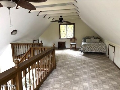 This simply sweet chalet getaway is nestled on a pretty forested on The Hideout Golf in Pennsylvania - for sale on GolfHomes.com, golf home, golf lot