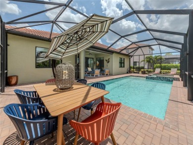 For the connoisseur of life, an ideal home is in perfect harmony on Sarasota National Golf Club in Florida - for sale on GolfHomes.com, golf home, golf lot