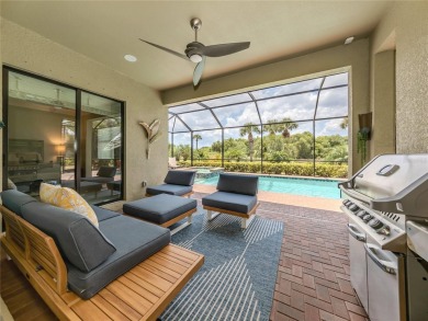 For the connoisseur of life, an ideal home is in perfect harmony on Sarasota National Golf Club in Florida - for sale on GolfHomes.com, golf home, golf lot