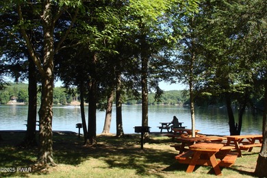 This simply sweet chalet getaway is nestled on a pretty forested on The Hideout Golf in Pennsylvania - for sale on GolfHomes.com, golf home, golf lot