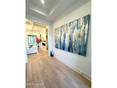 Discover modern elegance in this stunning home located in the on Reunion Golf Club in Mississippi - for sale on GolfHomes.com, golf home, golf lot