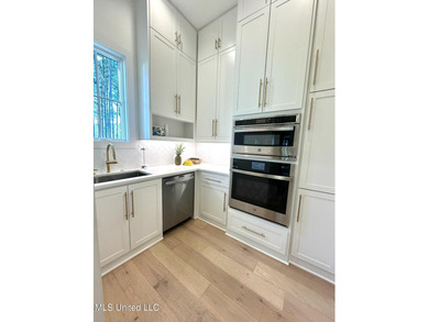 Discover modern elegance in this stunning home located in the on Reunion Golf Club in Mississippi - for sale on GolfHomes.com, golf home, golf lot