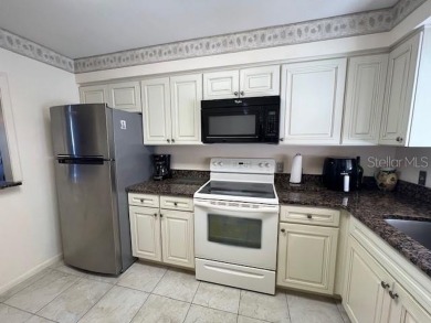 BIG PRICE REDUCTION!!!!*****DOWNSTAIRS 2 BEDROOM 2 BATH WITH on The Meadows Golf and Country Club in Florida - for sale on GolfHomes.com, golf home, golf lot