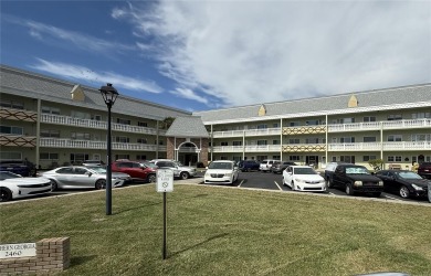 Welcome to this beautiful 2-bedroom, 2-bath END unit condo in on On Top Of The World Golf Course in Florida - for sale on GolfHomes.com, golf home, golf lot