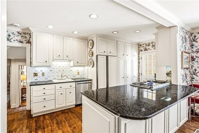 Charming cottage-style home just listed in desirable Collier on Bobby Jones Golf Club in Georgia - for sale on GolfHomes.com, golf home, golf lot