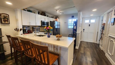 Stunningly renovated and rarely available, this spacious on Lakeview Golf Club in Florida - for sale on GolfHomes.com, golf home, golf lot