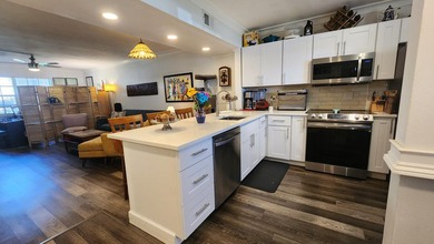 Stunningly renovated and rarely available, this spacious on Lakeview Golf Club in Florida - for sale on GolfHomes.com, golf home, golf lot