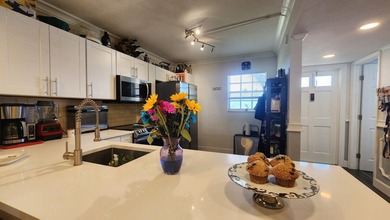 Stunningly renovated and rarely available, this spacious on Lakeview Golf Club in Florida - for sale on GolfHomes.com, golf home, golf lot