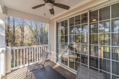 This top floor, fully furnished condo at River Crossing in on Barefoot Resort and Golf Club - Norman Course in South Carolina - for sale on GolfHomes.com, golf home, golf lot